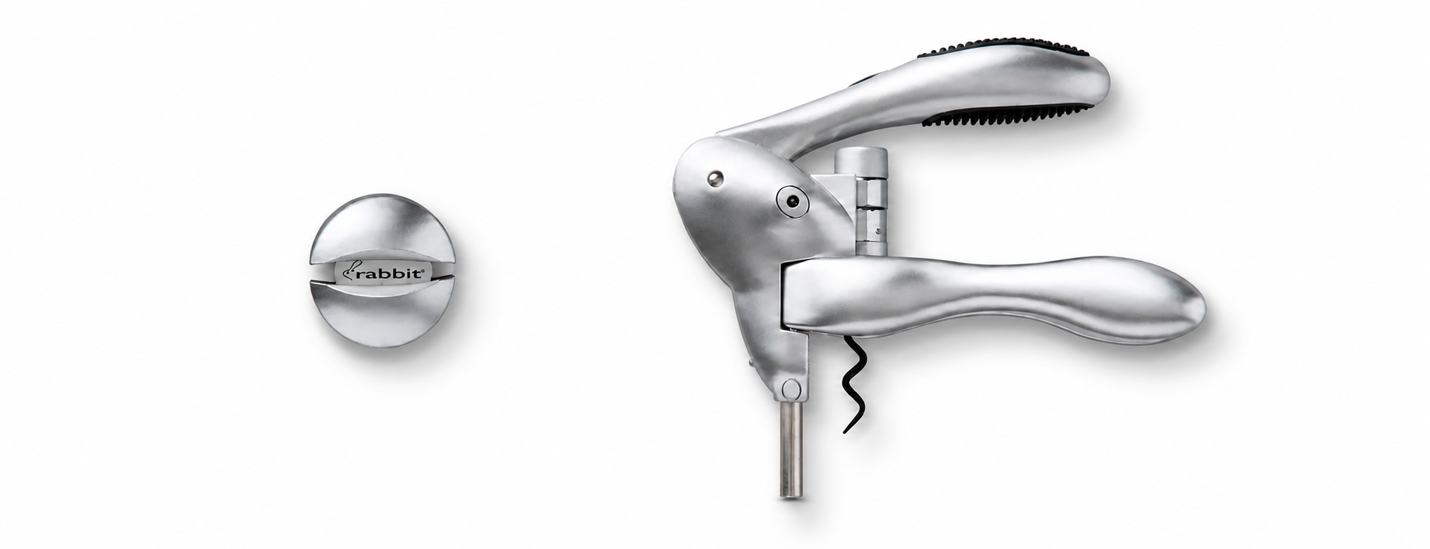 Original Rabbit foil cutter and silver lever corkscrew arranged on a white field